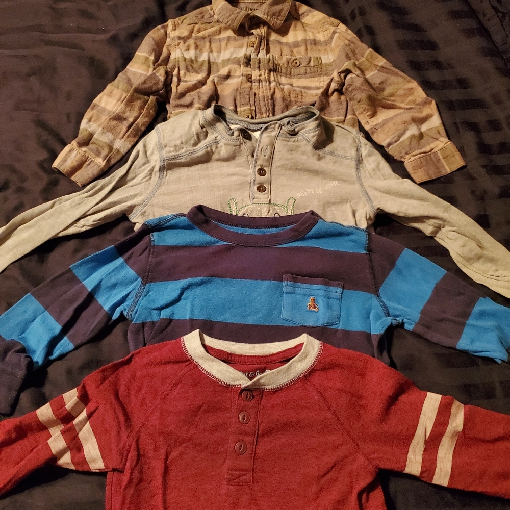 Lot of boys long sleeve shirts.